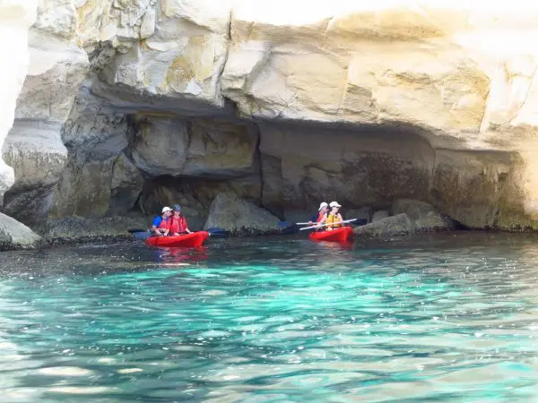 Spainventure an Adventure enjoying a kayaking trip in Andalusia coleagues at Mediterranean Sea at cave