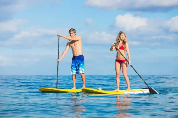 Malaga Tourism Adventure Spainventure paddle surf at Mediterranean Sea Adventure colleagues paddling