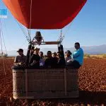 spainventure-hot-air-balloon-flight-at-guadix-50th-birthday-andalucian-american-landing-in-a-field-fuengirola