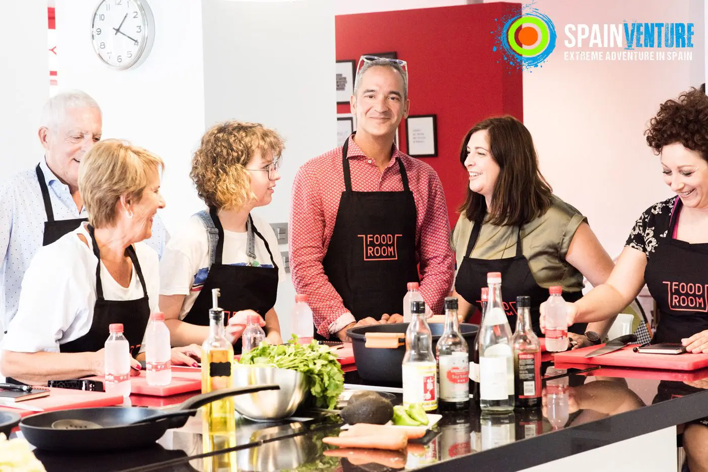 Spainventure a group of a single Traveller cooking in an experience Spainventure a group of a single Traveller cooking in an experience